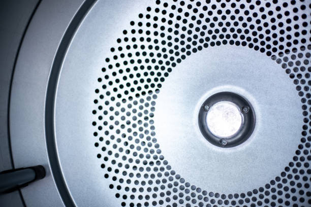 istock Close up photo of inside dryer machine drum. 1154046426