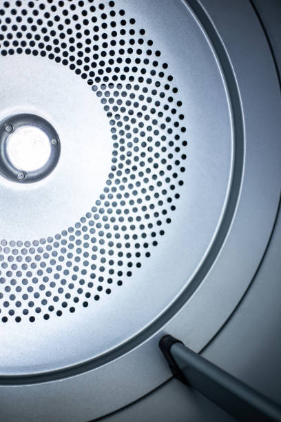 istock Close up photo of inside dryer machine drum. 1154046432