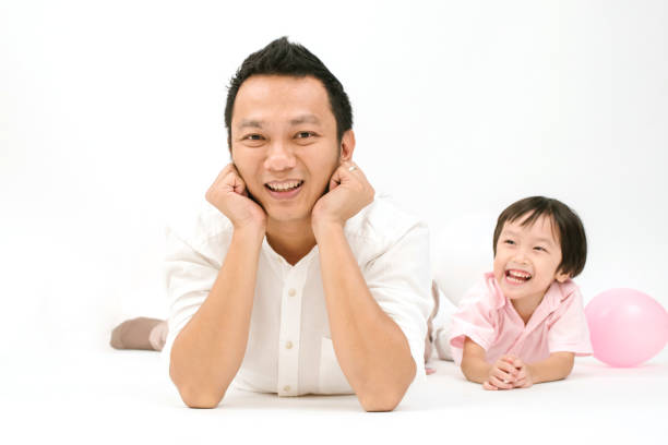 istock Portrait of Thai father and son at studio 1154046710