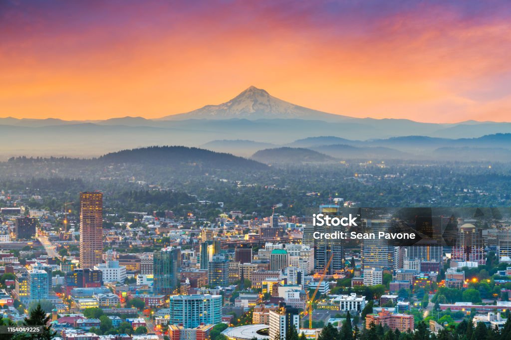 Portland, Oregon, USA downtown Portland, Oregon, USA downtown skyline with Mt. Hood at dawn. Portland - Oregon Stock Photo