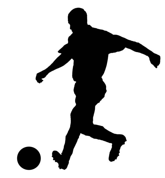 soccer player as silhouette isolated while shooting a football - 7585 imagens e fotografias de stock