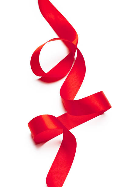 istock Red ribbon on white background 1154050688