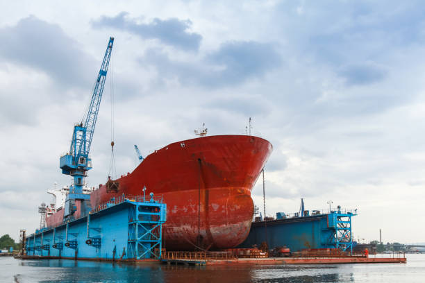 istock Red tanker is under repairing 1154059352