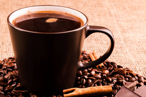 istock Dark chocolate lies on coffee beans before a cup 1154060629