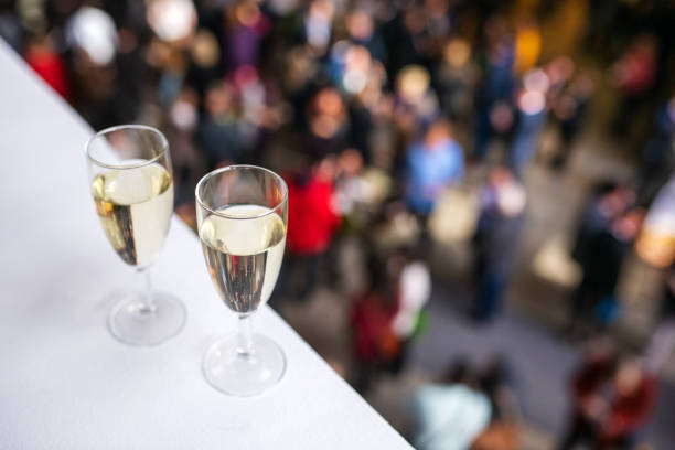 Germany: Two glasses of sparkling wine stand at a feast on a balcony.