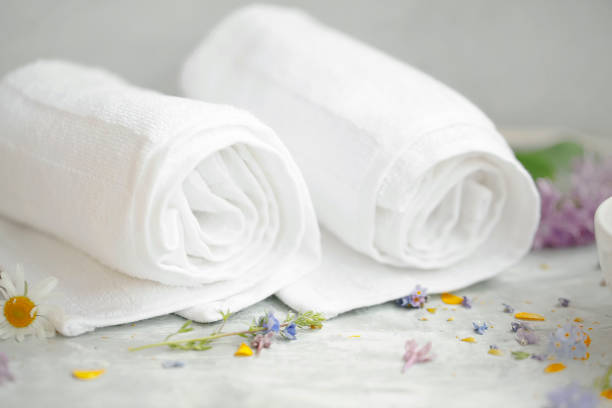 istock Spa still life setting with white cotton towels, selective focus 1154062306
