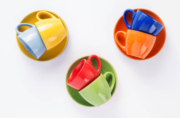 istock empty cup and saucer isolated on white background 1154063391