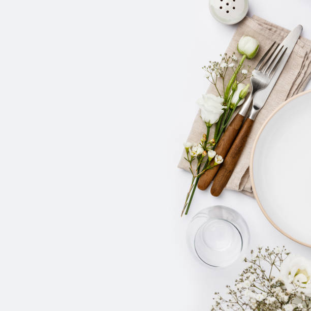 istock Empty white plate and cutlery on a napkin 1154065163