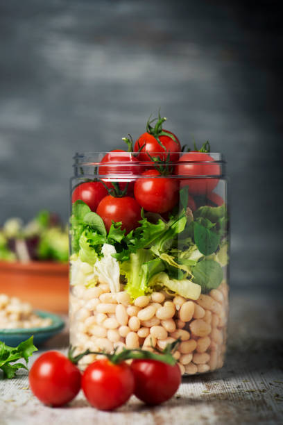 istock jar salad with white beans and vegetables 1154066221