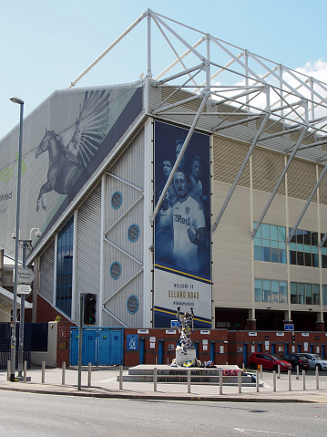 leeds, west yorkshire, united kingdom - 16 may 2019: elland road football stadium the home of leeds united witth bremner square decorated with team scarves and shirts on the day after the championship playoffs on 15th may 2019