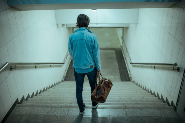 istock Traveler leaving city 1154070167