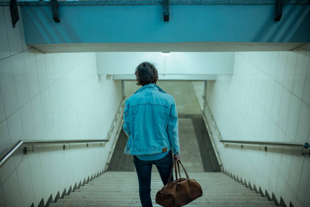 istock Traveler leaving city 1154070243