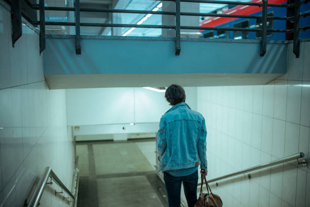 istock Traveler leaving city 1154070272