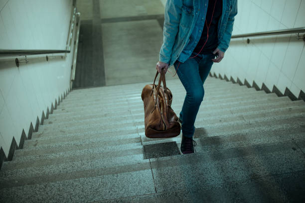 istock Traveler leaving city 1154070779