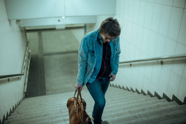 istock Traveler leaving city 1154070835