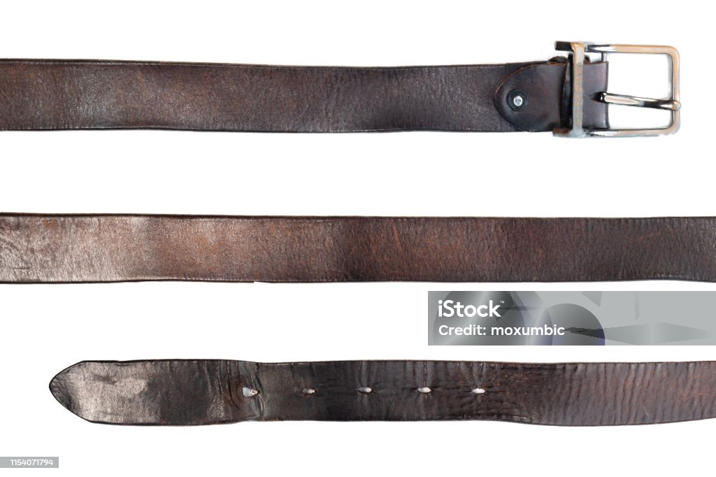 old black leather belt on white background Strap Stock Photo