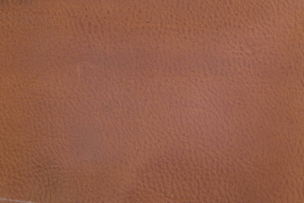 istock close up of Genuine brown leather texture background 1154071863