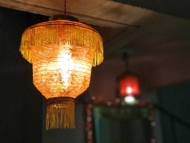 istock yellow diwali lantern with blur background 1154076268