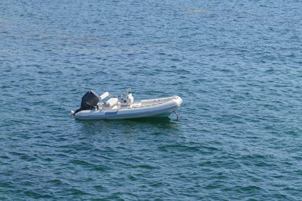 istock inflatable motor boat at sea at anchor 1154083576