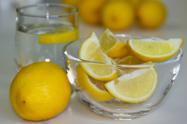 istock Freshly sun drenched lemons, on background Bokeh. 1154084970