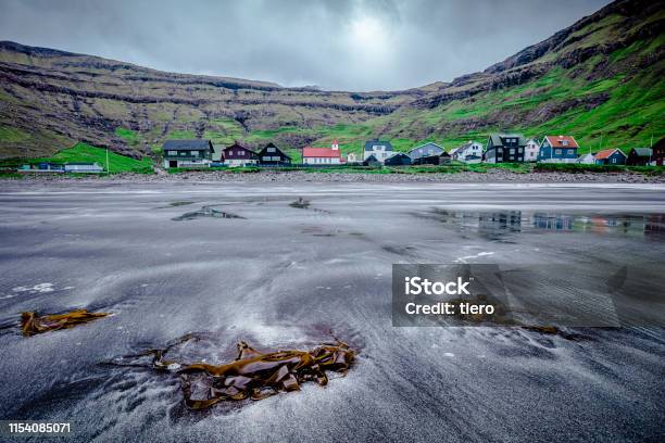 Village Tjørnuvík In The Faroe Islands Stock Photo - Download Image Now - Atlantic Ocean, Beach, Coastline