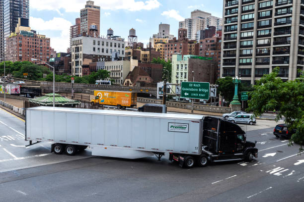 White and heavy truck with container in New York City, USA stock photo