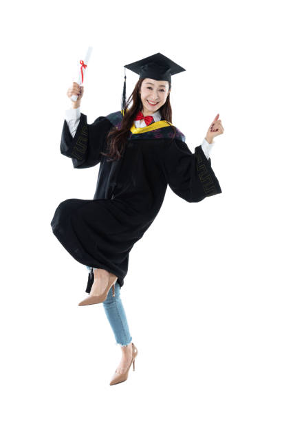 istock Graduate holding certificate on white background 1154088828