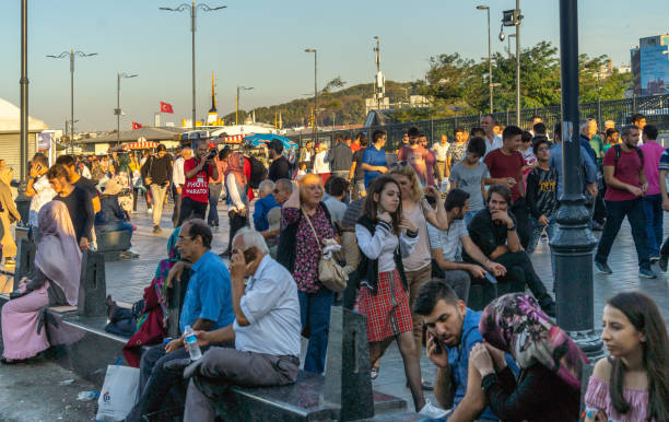 Waiting crowd at the bus station of the Old Town of Istanbul at the Golden Horn Istanbul, Turkey, September 22., 2018:Waiting crowd at the bus station of the Old Town of Istanbul at the Golden Horn golden horn istanbul photos stock pictures, royalty-free photos & images