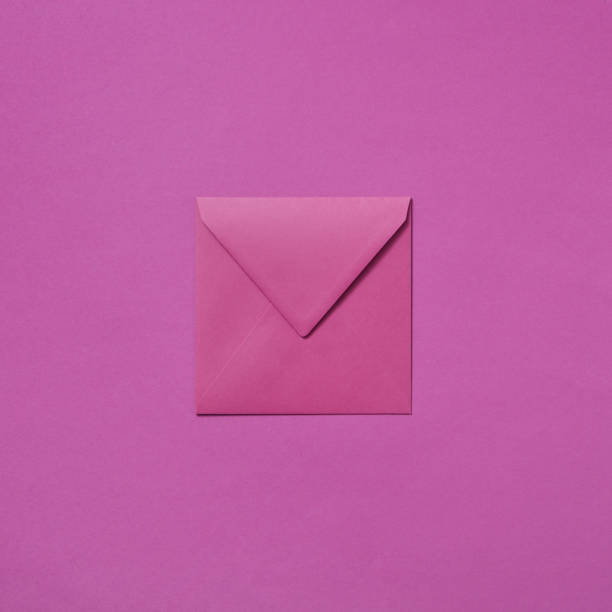 istock Craft envelope mock-up for invitation on a magenta background. 1154091049