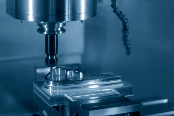 istock The CNC milling machine cutting the mold parts with the solid ball end-mill tool. 1154091078