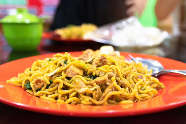 Indonesian stir-fried noodles (Bakmi Goreng) with chicken or seafood, a street-food noodle classic from Java island.