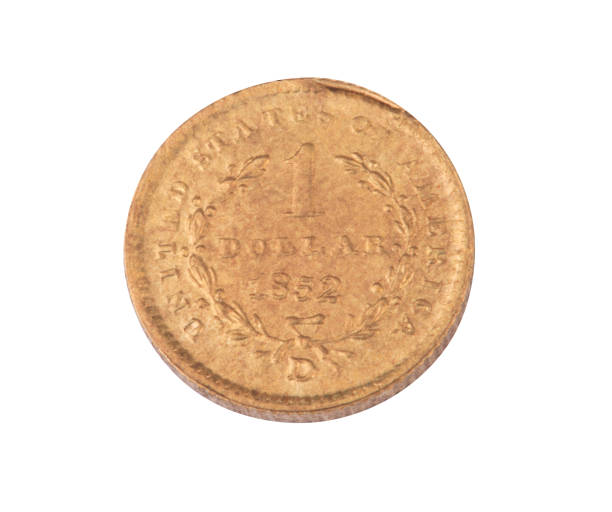 istock one gold 1852 dollar coin isolated on white background 1154096728