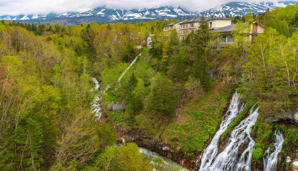 Shirahige Waterfalls Shirahige-no-taki Waterfalls and the Tokachi river in Biei, Hokkaido, Japan kamikawa district ishikari stock pictures, royalty-free photos & images
