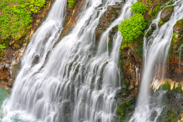 Shirahige Waterfalls Shirahige-no-taki Waterfalls and the Tokachi river in Biei, Hokkaido, Japan kamikawa district ishikari stock pictures, royalty-free photos & images