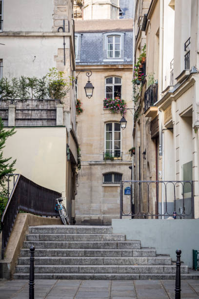 Small pedestrian walkway overlooking the rue de la Verrerie in Paris stock photo