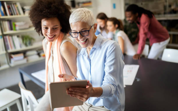 istock Successful group of business people at work in office 1154104886