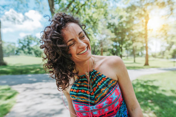 istock Dancing woman enjoying life 1154108876