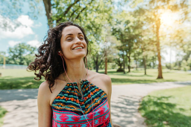 istock Dancing woman enjoying life 1154108906
