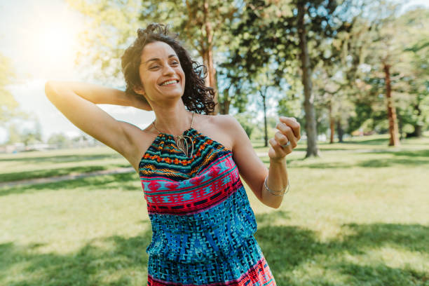istock Dancing woman enjoying life 1154109001