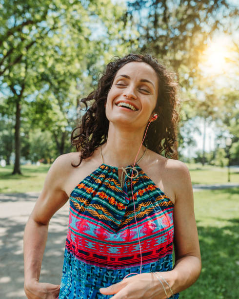 istock Dancing woman enjoying life 1154109098
