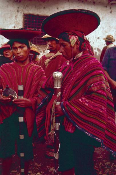 Portrait of a Quechua boy of the Willoc ethnic group on the table in his home with copy space