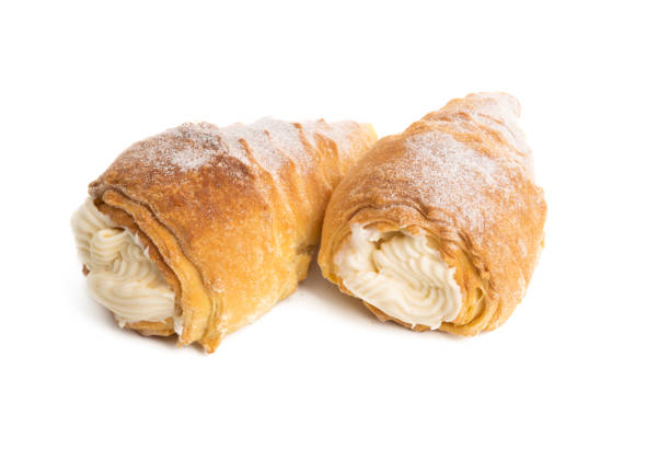 istock custard tubing with cream isolated 1154113596