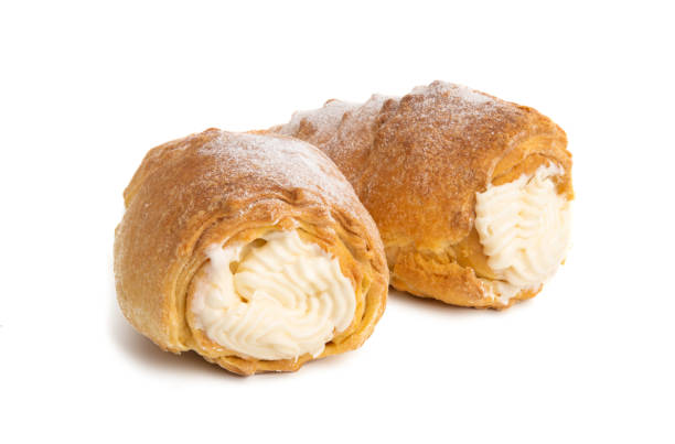 istock custard tubing with cream isolated 1154114037
