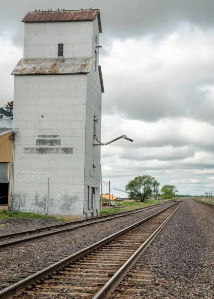 Railroad and old grain elevator in rural Nebraska