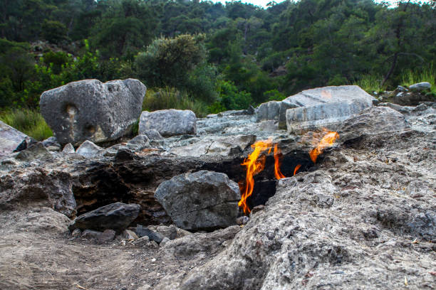 Yanartas burning stones is a geographical feature near the Olympos valley and national park in Antalya Yanartas burning stones is a geographical feature near the Olympos valley and national park in Antalya Province in southwestern Turkey cirali stock pictures, royalty-free photos & images