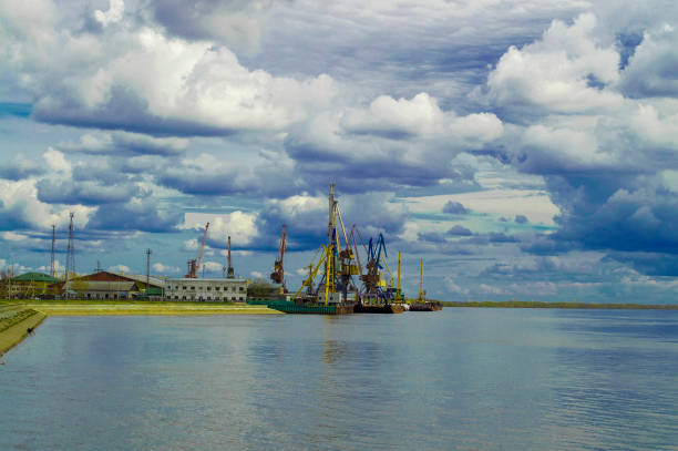 View of the cargo river port on the Ob River, Surgut, Russia - 03 June, 2019