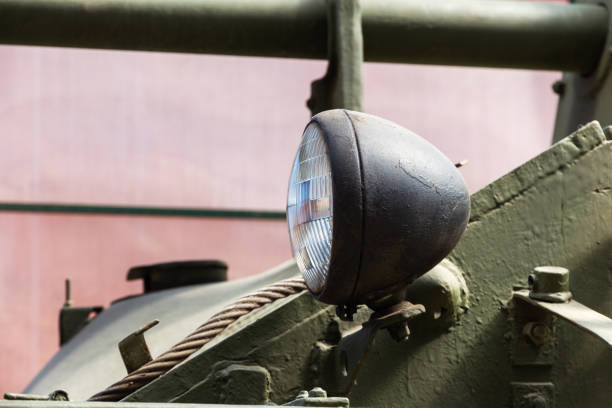 istock Headlight on military heavy armored vehicles 1154127071