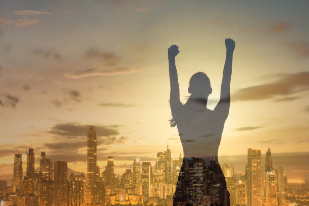 woman power! - women standing fist success imagens e fotografias de stock