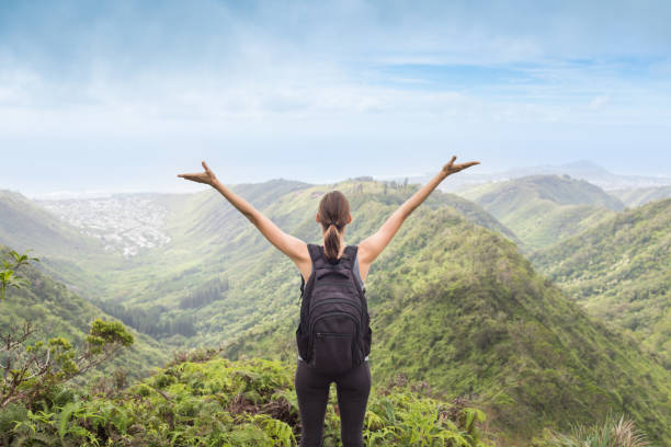istock Female hiker enjoying the beautiful view 1154127410