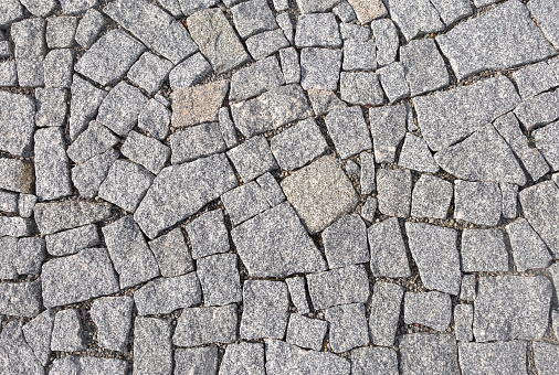 Close up of stone pavement texture. Top view.